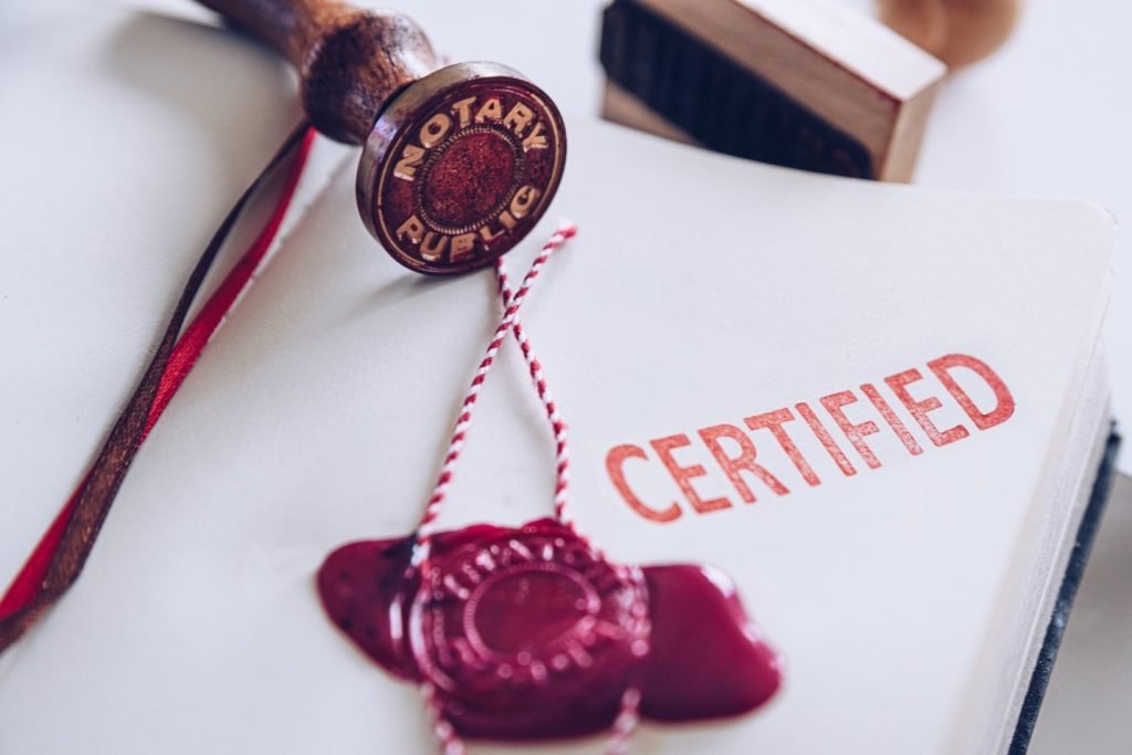 A stamp with a notary public seal.