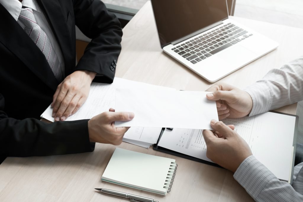 Loan Signing Agent (LSA) doing a signing with a client