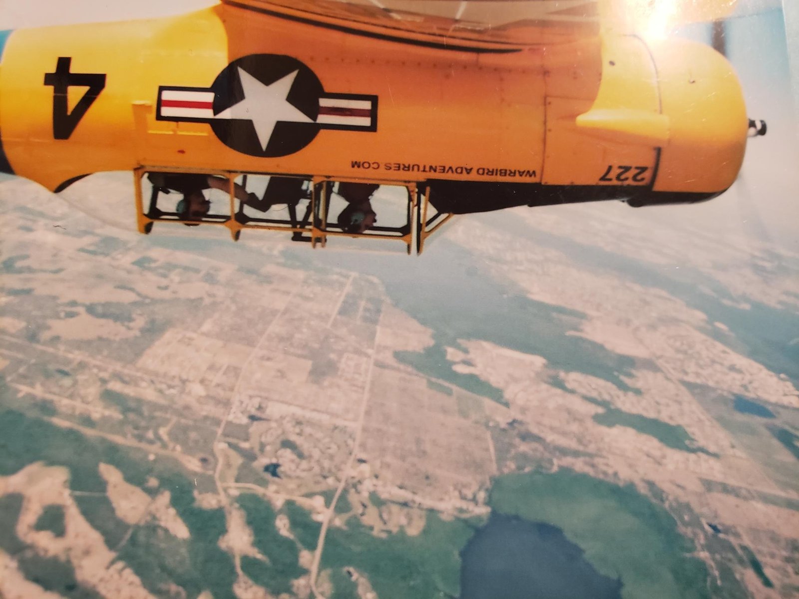 Guy Case flying a classic airplane