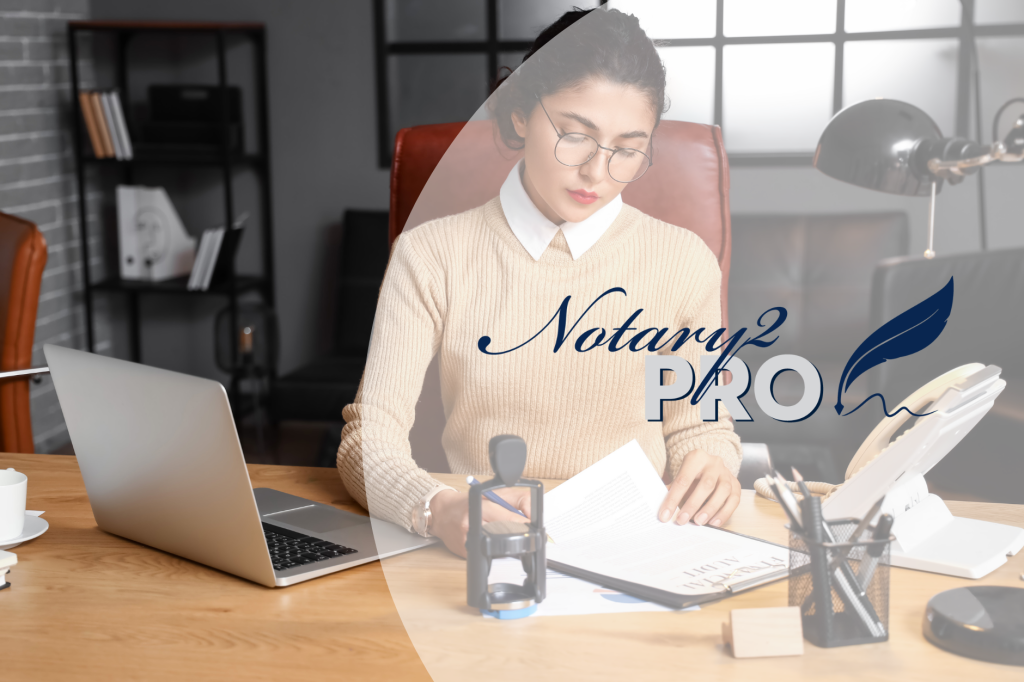 A woman doing remote online notarization and signing documents.